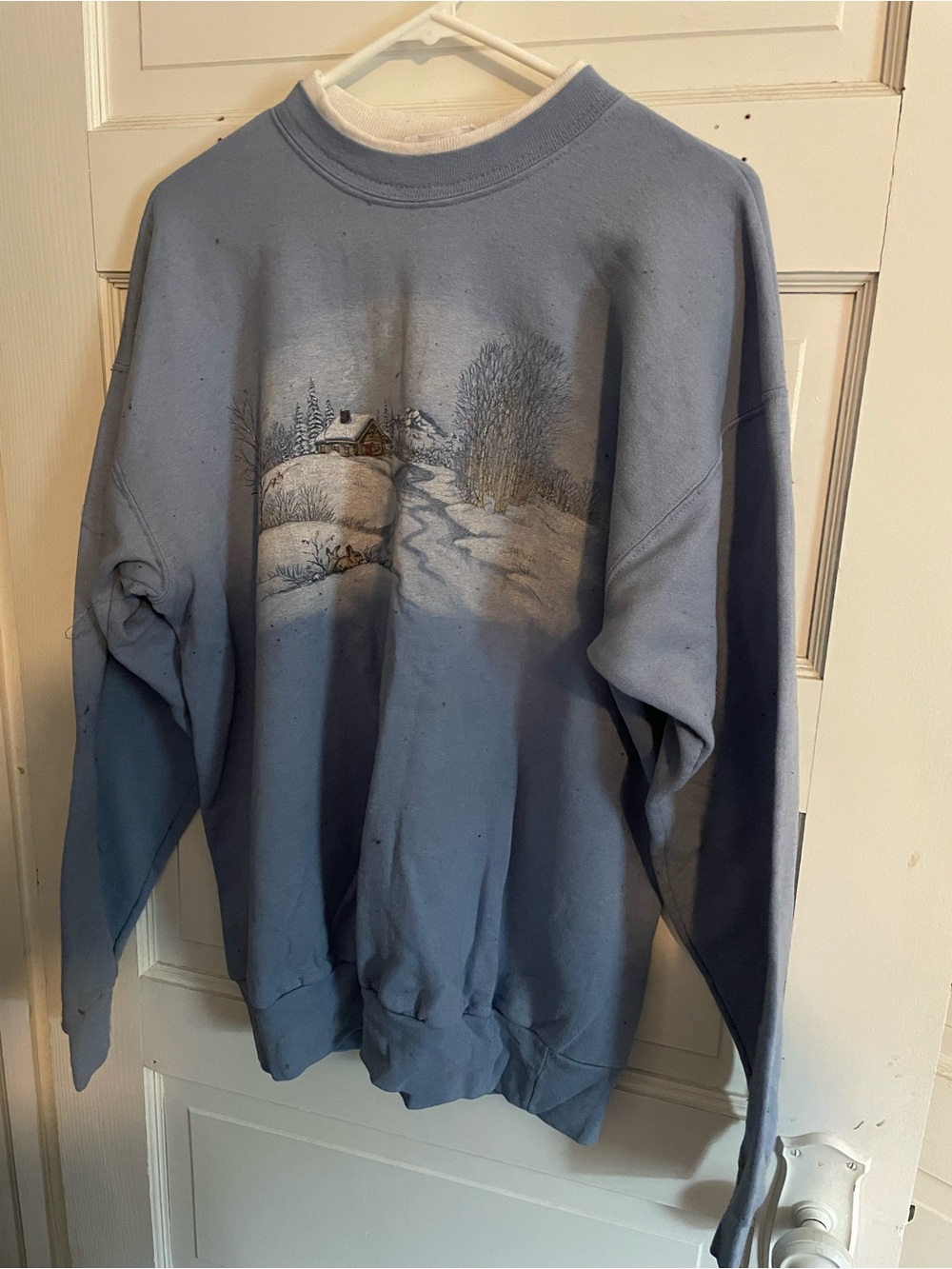 Women's Light Blue Crewneck Sweatshirt with Winter Cabin Graphic
